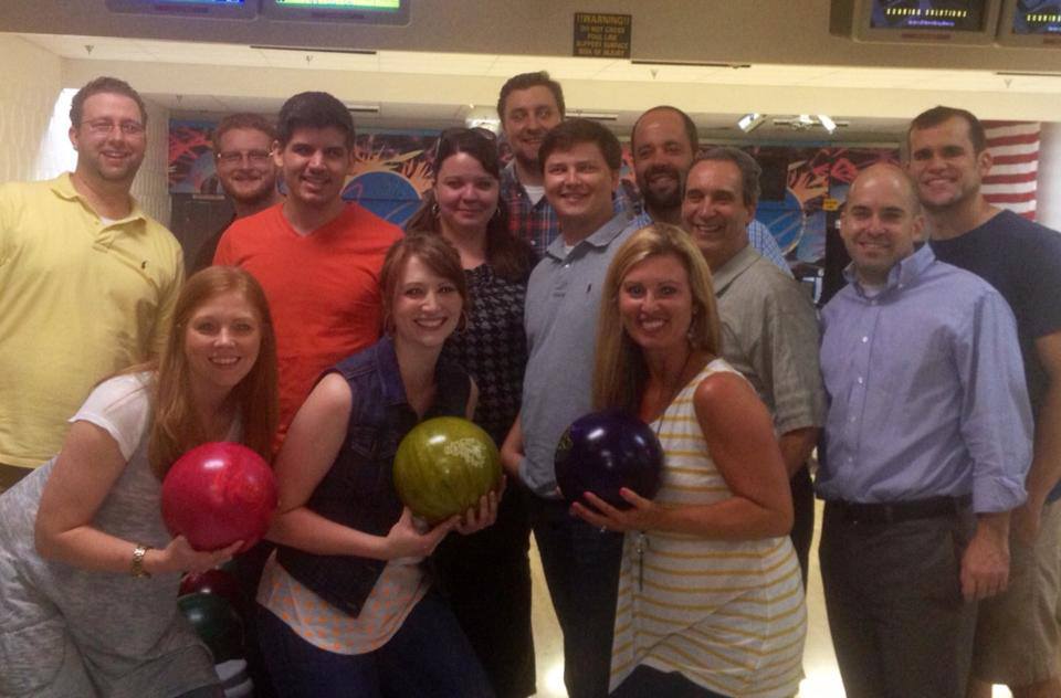 Infomedia employees going bowling together