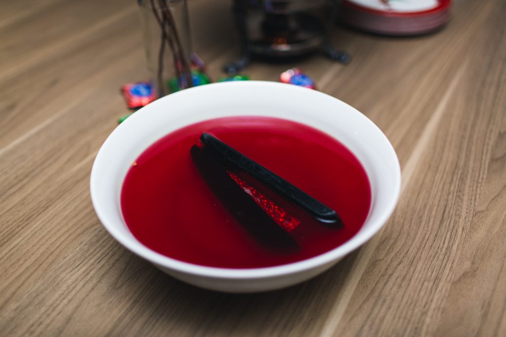 red jello with a stapler in it