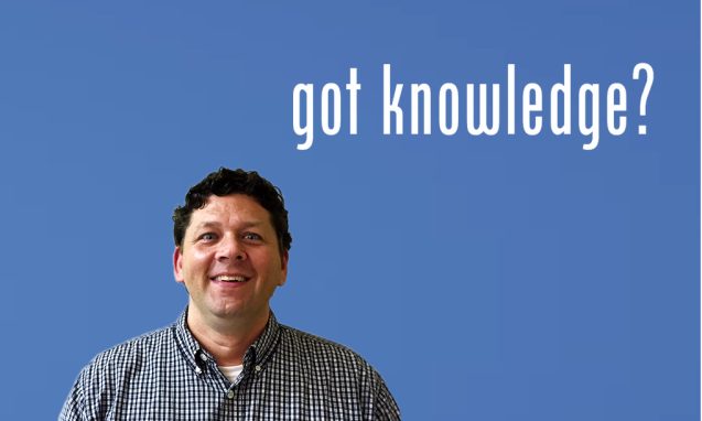 Man standing with "Got Knowledge?" written above him