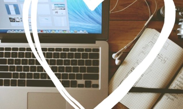 A graphic of a drawn heart over a laptop and a notebook