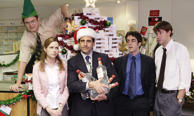 A picture from the show "The Office" during an episode of a Christmas party