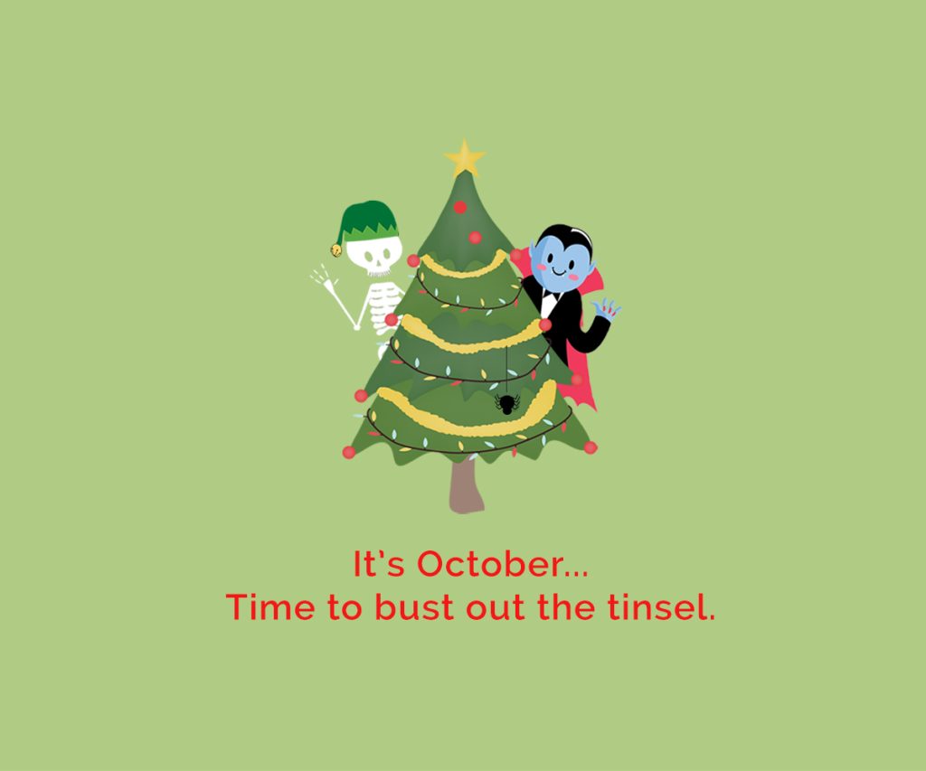 Christmas graphic of a vampire and skeleton waving behind a tree
